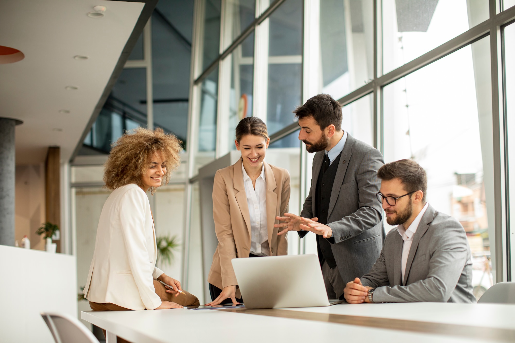 Stock image of group in an office working together 